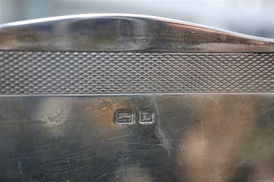 A 1930s silver cigarette box, with engine turned lid, 17.3cm.